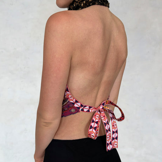 Top with embroidered motifs