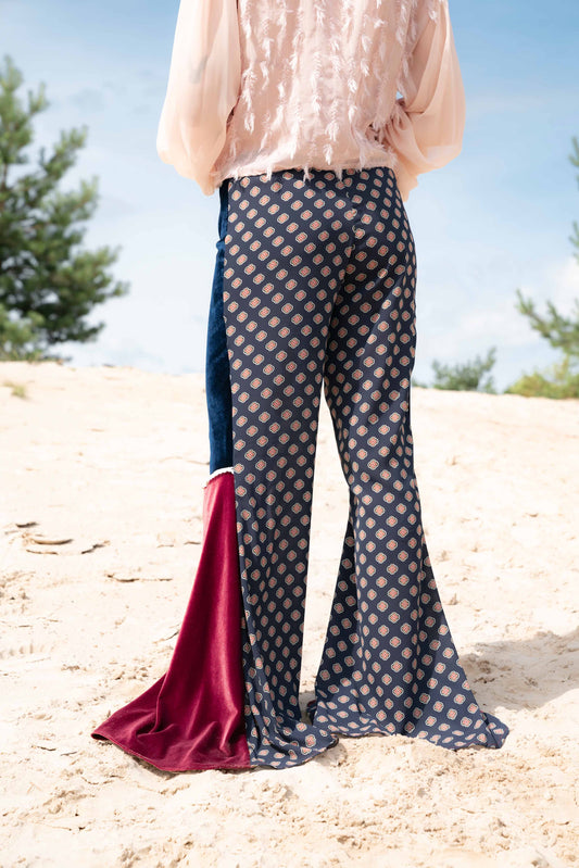flared trousers with velvet inserts and ornamental patterns