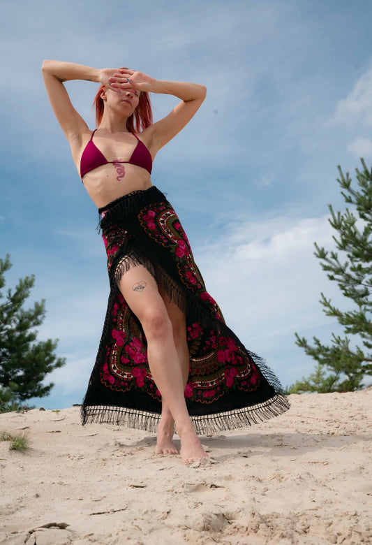 Wrap skirt with floral motifs and fringe