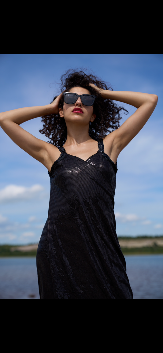 Wrap dress in black sequined fabric