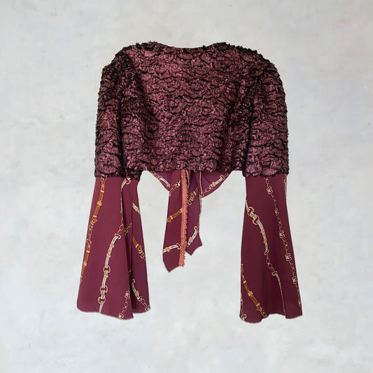 Blusa annodata con motivi ornamentali e inserti in pelliccia sintetica